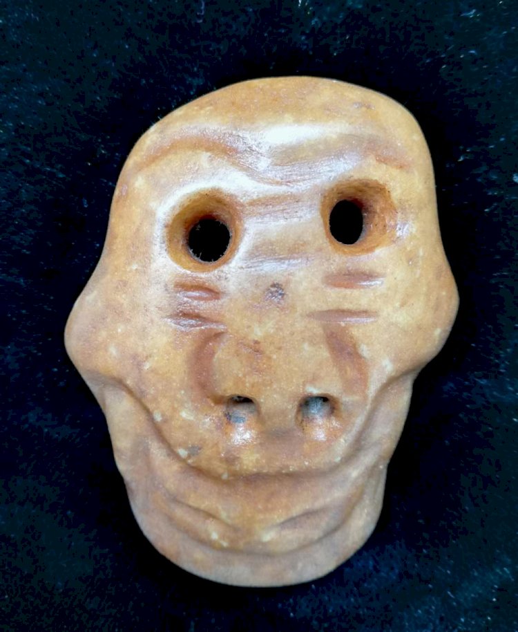 C009. Archaic Jade Man's Face