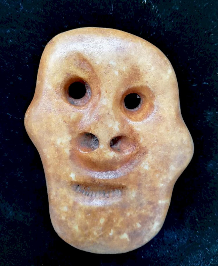 C009. Archaic Jade Man's Face