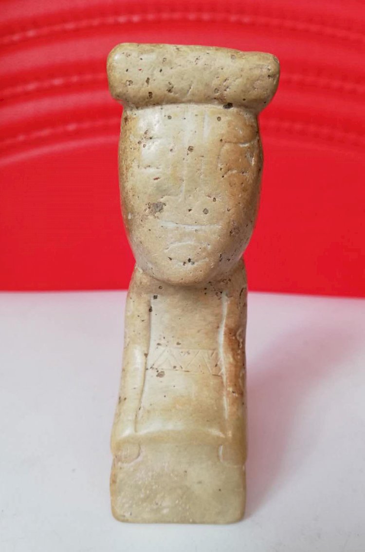 A020. Archaic White Jade of a Squatting Man