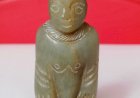 E001  A Jade Squatting Man with a Hat